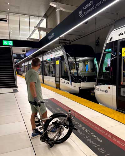 Helix folded waiting for subway train
